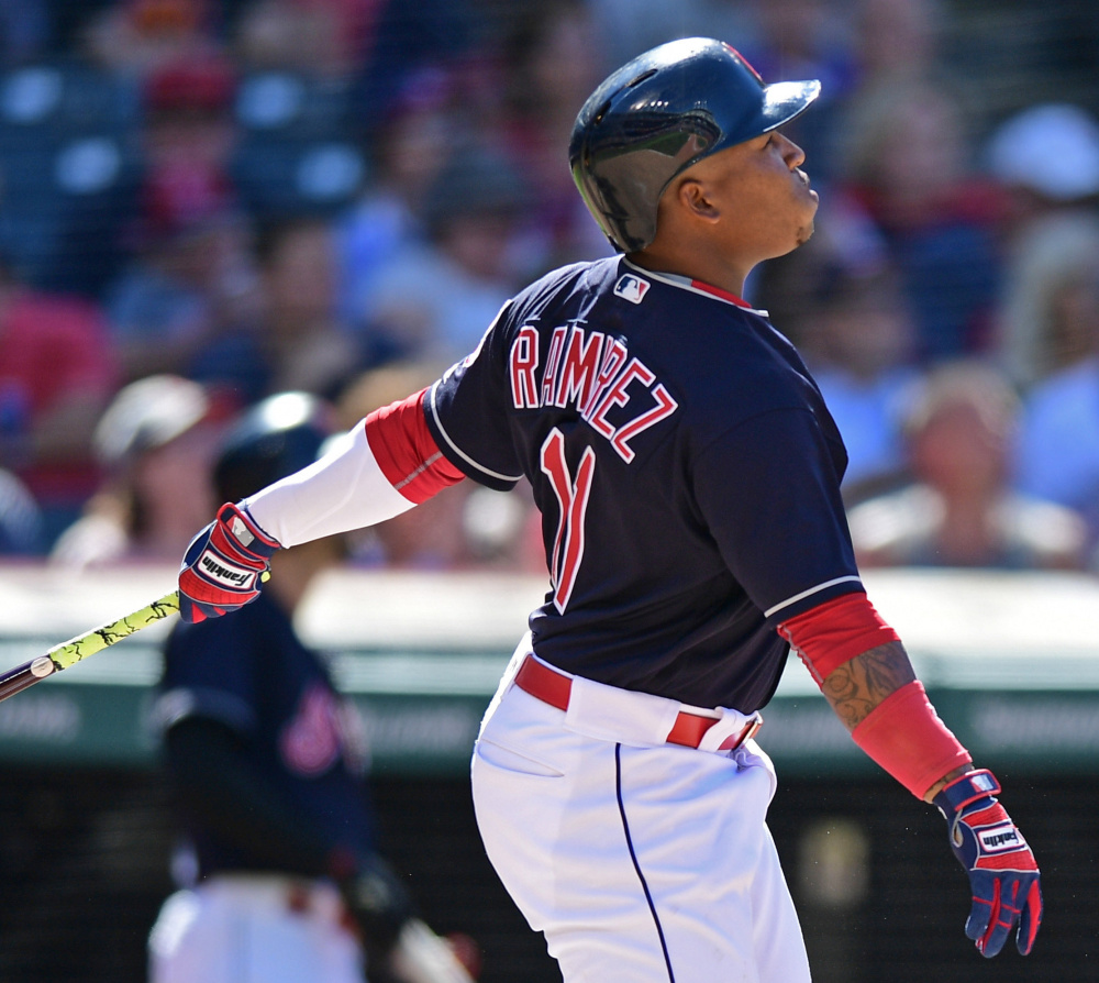 Cleveland's Jose Ramirez hits a two-run homer off Toronto relief pitcher Brett Cecil in the eighth inning of the Indians' 3-2 win Sunday in Cleveland.