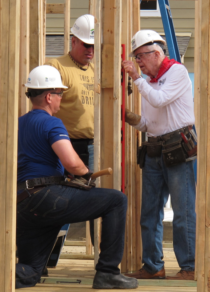 Former President Jimmy Carter works on a Habitat for Humanity project Monday. Carter said he thought he had just a few weeks to live during his battle with cancer.