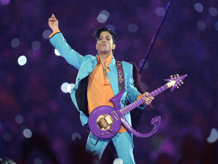Prince performs during the halftime show at the Super Bowl XLI football game at Dolphin Stadium in Miami in 2007. 