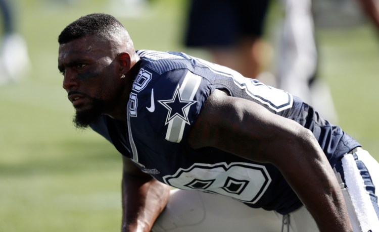 Receiver Dez Bryant of the Dallas Cowboys will miss Thursday night's exhibition game at Seattle with a concussion but, along with Coach Jason Garrett, doesn't appear concerned about missing the season opener.