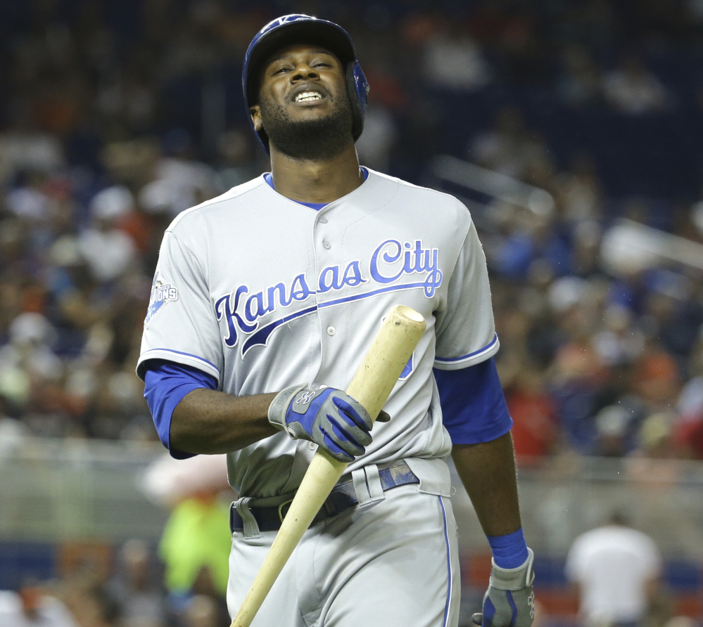 Kansas City's Lorenzo Cain returns to the dugout after lining out to second in the sixth inning of a 3-0 loss to the Marlins Wednesday at Miami.