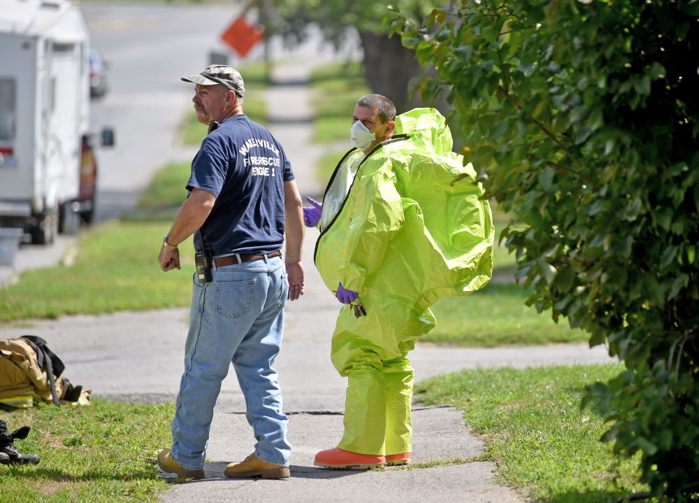 Waterville firefighters and other emergency personnel respond to a report of a chemical spill Thursday at a multi-family apartment building at 270 Main St. in Waterville. The call turned out to be over-use of a bug repellent containing diatomaceous earth.