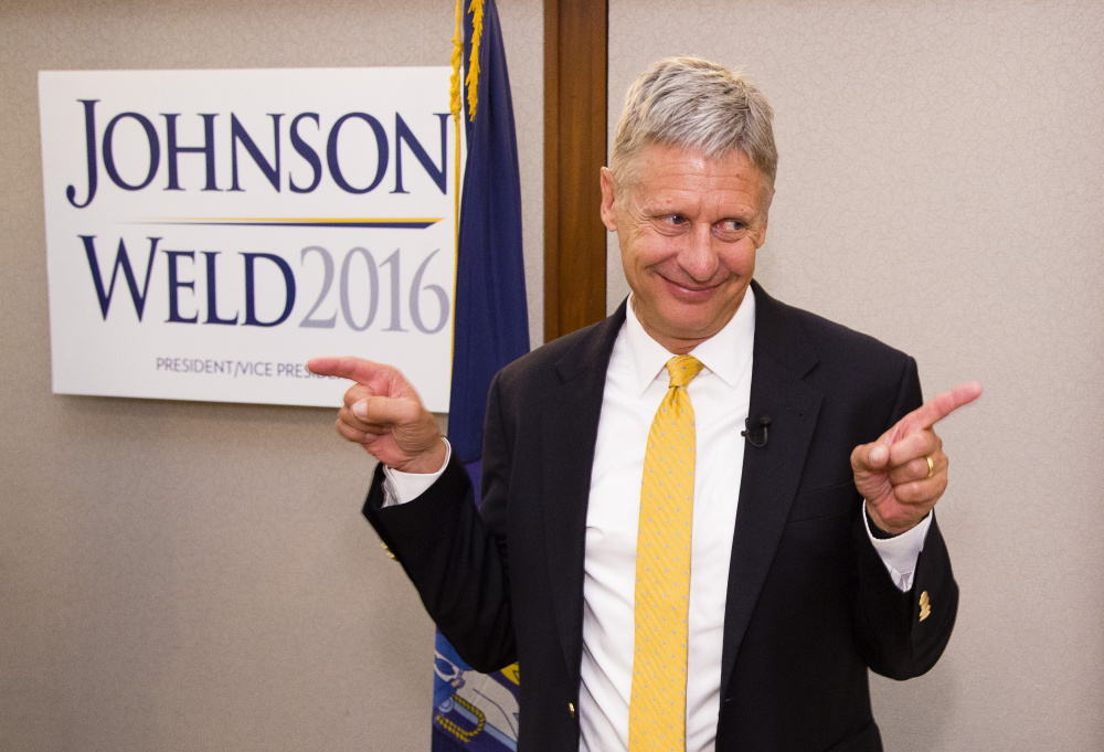 Former New Mexico governor and Libertarian presidential candidate Gary Johnson acknowledges supporters after his campaign speech at the Portland Regency on Friday.