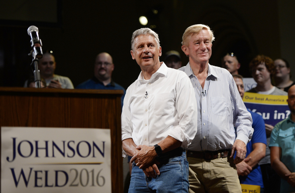 Gary Johnson, left, campaigning Friday in Lewiston with running mate Bill Weld, said his humility, desire to serve the public and willingness to work with people at both ends of the political spectrum distinguish him from Donald Trump and Hillary Clinton.
Shawn Patrick Ouellette/Staff Photographer