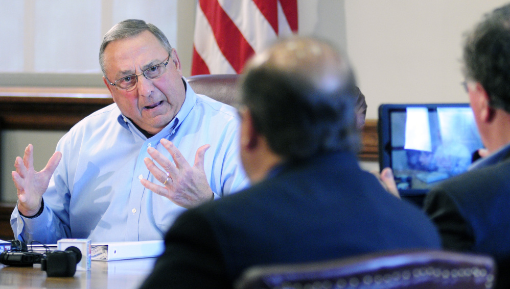 Gov. LePage defends his racial profiling and threats of violence against a state lawmaker in a meeting with reporters Friday.