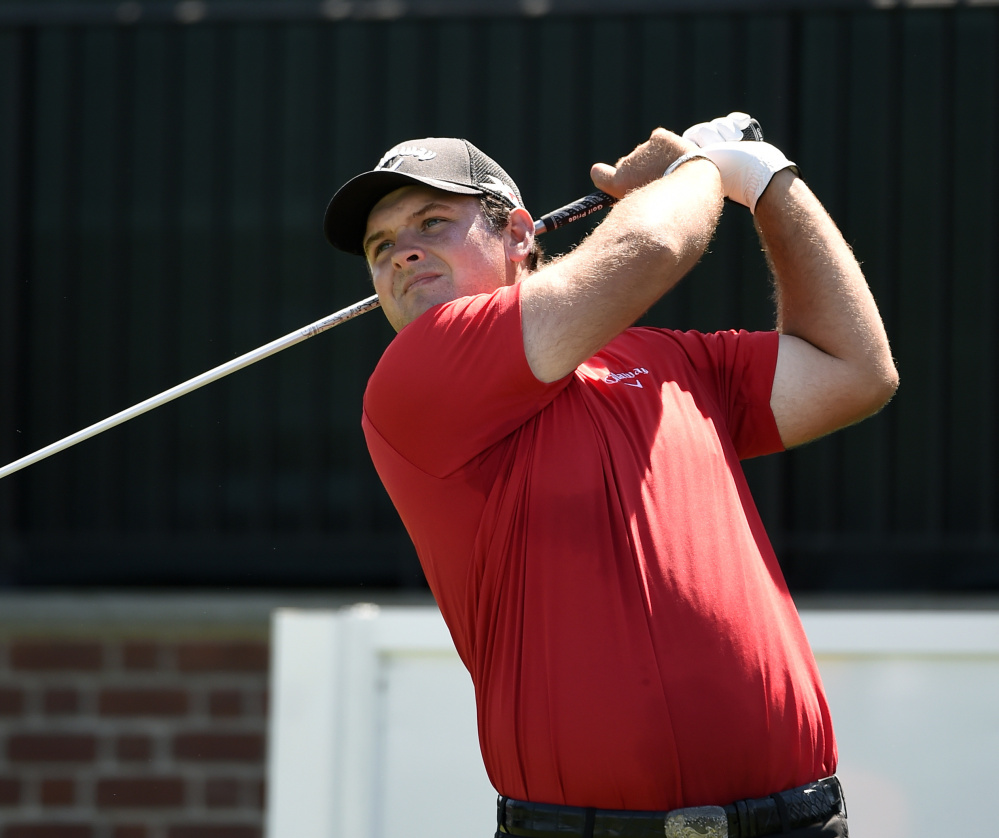 Patrick Reed, shown teeing off the first hole during the final round of The Barclays in Farmingdale, N.Y., Sunday, wins the tournament and a spot on the Ryder Cup team.