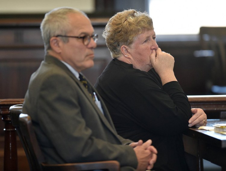 Julie Smith sits next to her attorney, Walter Hanstein, in May in Somerset County Superior Court when she pleaded guilty to embezzlement. 