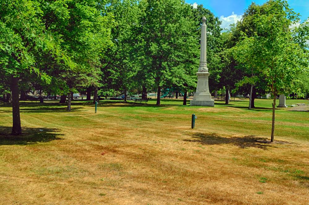 This Wednesday photo shows brown grass near the Civil War Memorial on Gardiner Common, one of the local public spaces showing signs of the dry weather.