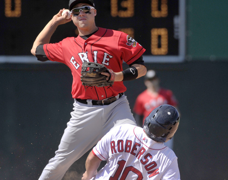 Erie SeaWolves second baseman Corey Jones unsuccessfully tries to turn a double play after forcing out Tim Roberson of the Sea Dogs in the ninth inning Thursday afternoon at Hadlock Field. Erie won, 9-3.