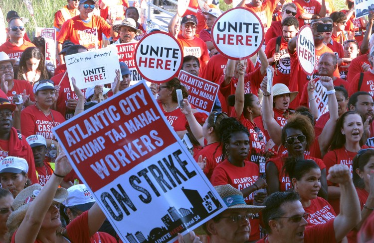 Striking union members rally outside the Trump Taj Mahal casino in Atlantic City, N.J., in July. On Thursday, the owners announced that the casino will close after Labor Day. 