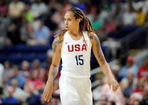 Brittney Griner walks on the court during the first half of a women's exhibition basketball game, in Bridgeport, Conn. in this July 29 file photo. Griner and the the U.S. women's basketball team opened Olympic play with a win against Senegal on Sunday.