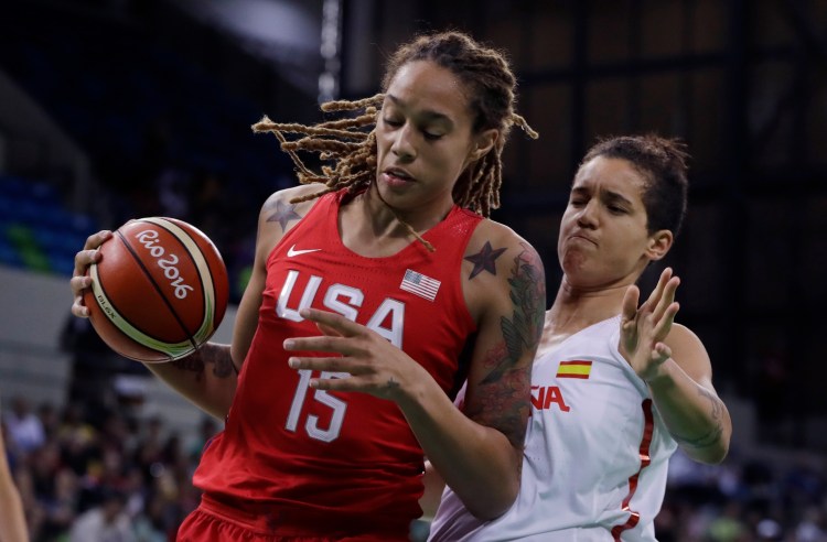 United States center Brittney Griner (15) and Spain forward Laura Nicholls battle under the net during the first half of a women's basketball game at the 2016 Summer Olympics in Rio de Janeiro on Monday. (AP Photo/Carlos Osorio)
