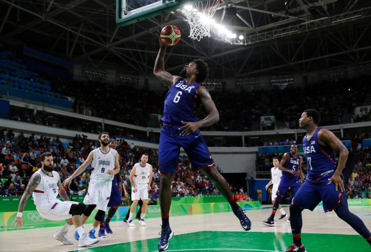 The United States' DeAndre Jordan (6) pulls in a rebound against Serbia during the men's gold medal basketball game in Rio de Janeiro on Sunday. Associated Press/Eric Gay