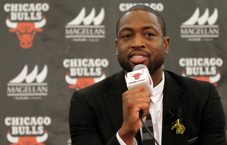 Chicago Bulls player Dwyane Wade speaks during a news conference in Chicago in July. (AP Photo/Tae-Gyun Kim)