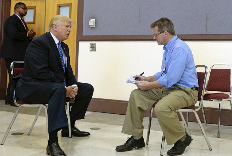 Press Herald Staff Writer Scott Thistle interviews Republican presidential candidate Donald Trump before his rally Thursday at Merrill Auditorium in Portland. 