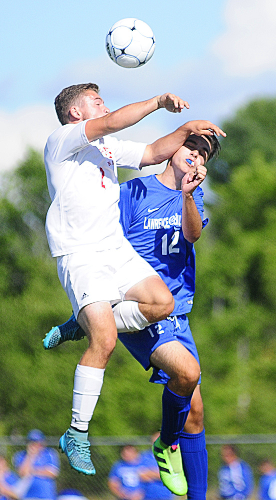 Cony's Jeff Bilodeau, left, and Lawrence's Nathan Buck collide while battling for a header during a game Friday in Augusta.