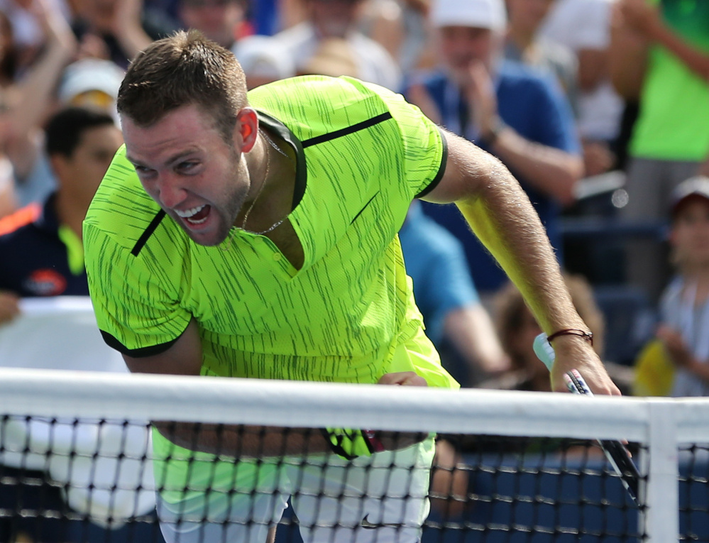 Jack Sock of the United States reacts Friday after defeating Marin Cilic of Croatia in straight sets to reach the fourth round of the U.S. Open for the first time.