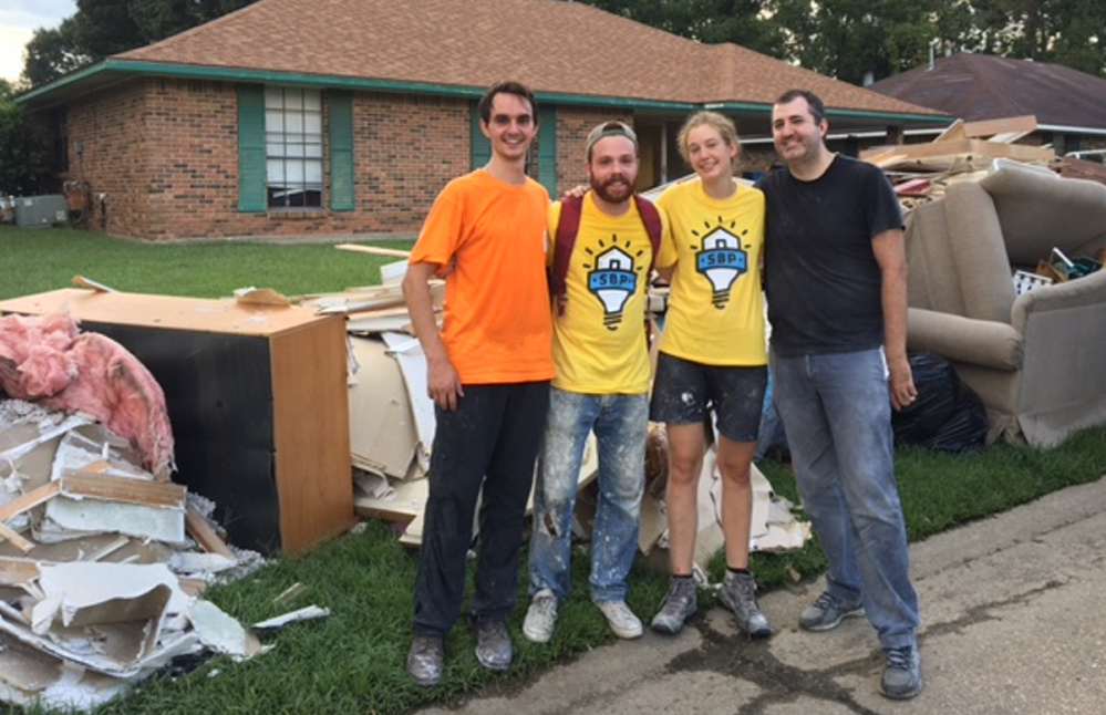 James McCullum, far left, worked recently with other volunteers in Baton Rouge, Louisiana, to help the victims of last month's historic flooding.