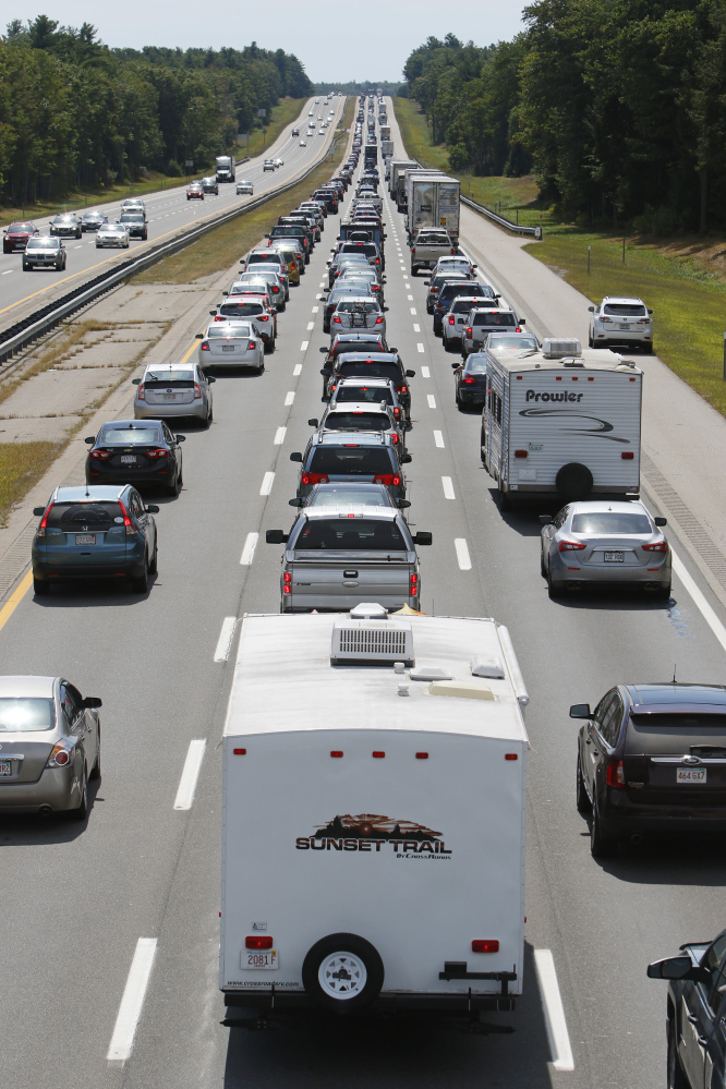 Southbound drivers fill the lanes of the Maine Turnpike in Wells on Monday as the Labor Day weekend comes to a close. By 1:30 p.m., stop-and-go traffic was reported on the 20-mile stretch between Wells and the New Hampshire border.