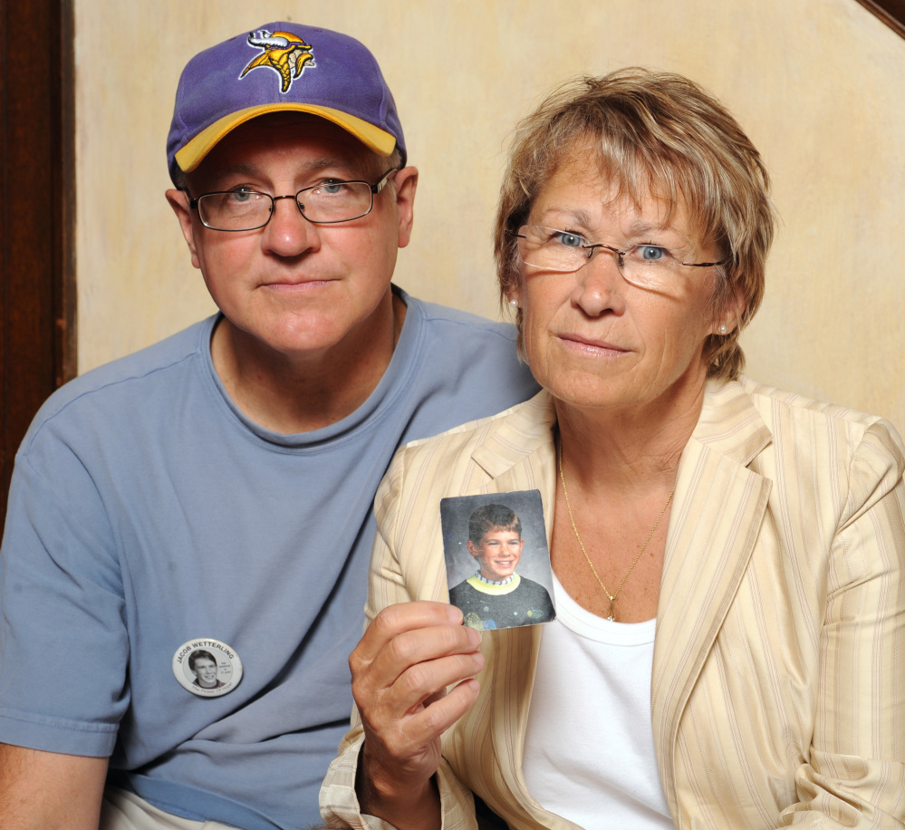 Patty and Jerry Wetterling hold up a photo in 2009 of their son Jacob Wetterling, who was abducted in October of 1989.  Patty Wetterling became a nationally known advocate for missing children.