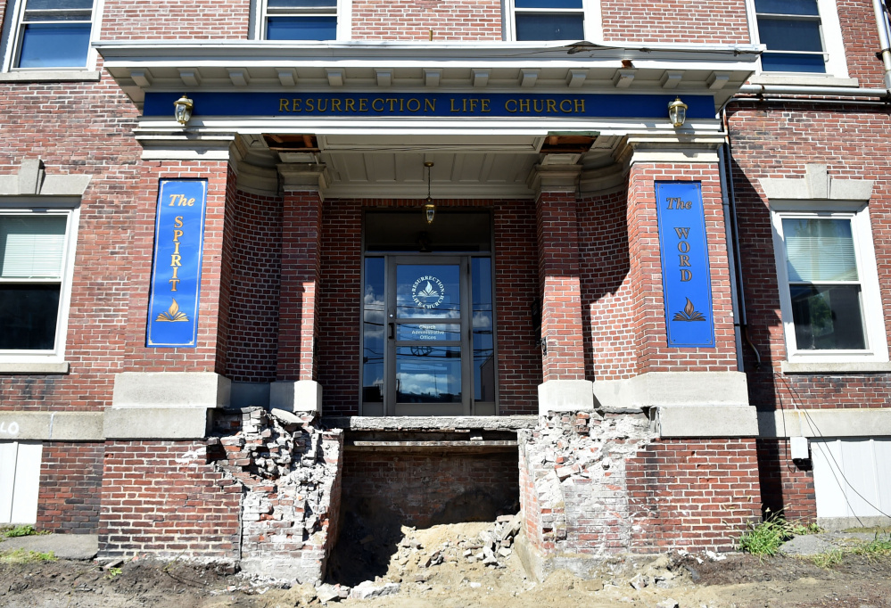 The front brick-and-mortar steps of the former Elk's Lodge on Appleton Street in Waterville have been removed in preparation for tearing the building down.