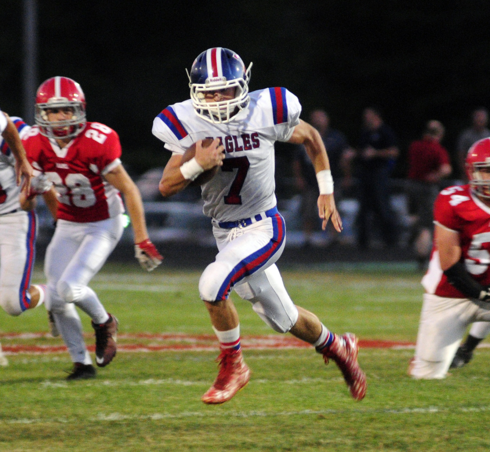 Messalonskee's Colby Dexter breaks into the open field Friday against Cony. Dexter scored four touchdowns and rushed for 192 yards in a 46-14 win.