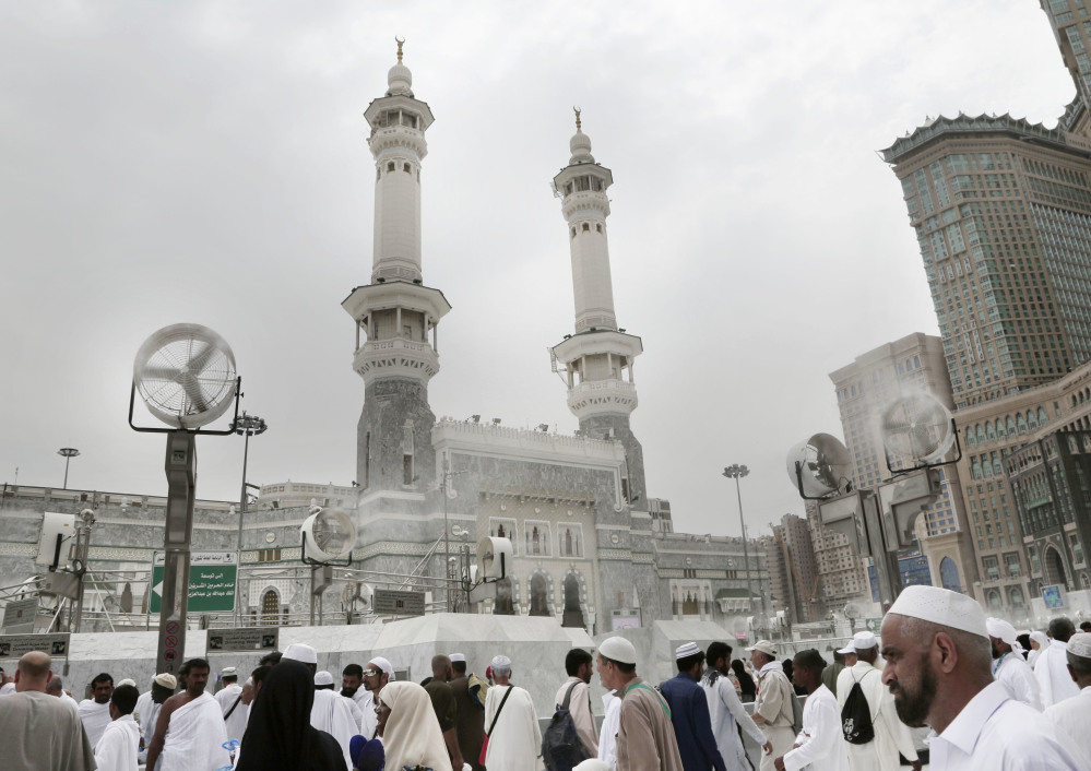 Muslim pilgrims visit the Grand Mosque in the Muslim holy city of Mecca, Saudi Arabia, on Friday before the annual hajj pilgrimage. Officials expect almost 2 million Muslims to take part in the five days of hajj rites in Saudi Arabia this year.