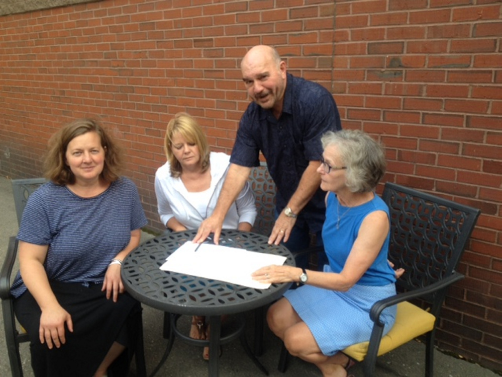 Members of a Skowhegan area business group will travel to Quebec City on Monday for three days of tours of bakeries, breweries and grist mills for possible collaboration. At work planning the tour Thursday were, from left, Amber Lambke, Pam Powers, Jon Kimbell and Jeanne Shay.