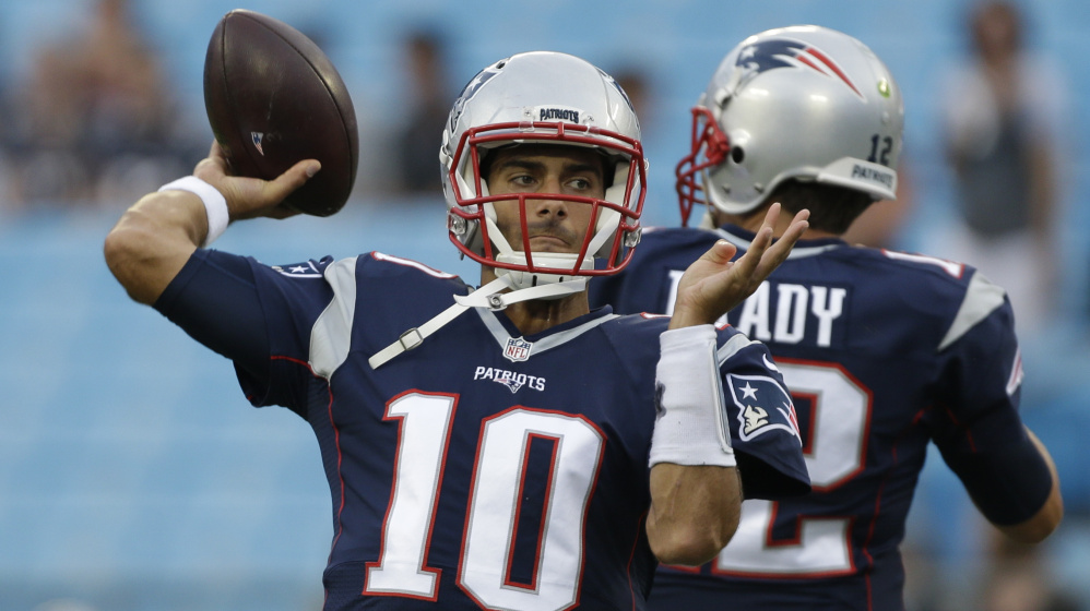 New England Patriots' Jimmy Garoppolo (10) warms up before an NFL football game against the Carolina Panthers in Charlotte, N.C., Friday, Aug. 26, 2016.