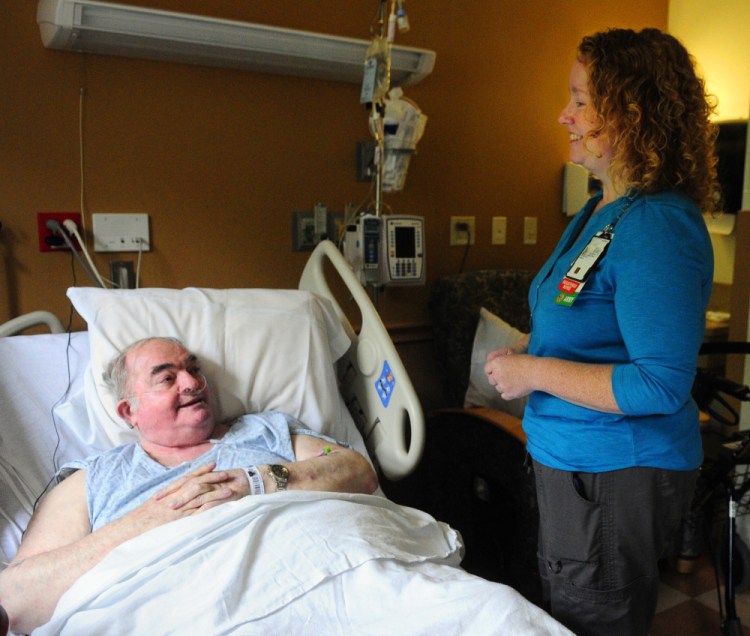 Veteran Curt Ramsdell of Baileyville chats with nurse Angela Boynton on Thursday in Building 200, the main hospital at the VA Maine Healthcare Systems-Togus campus outside Augusta.