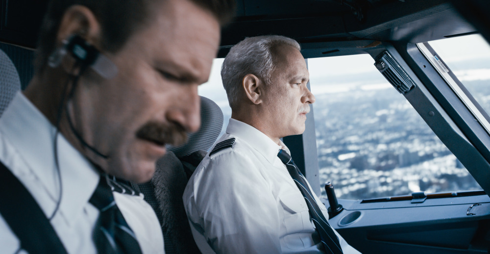 Tom Hanks, right, and Aaron Eckhart in a scene from "Sully."