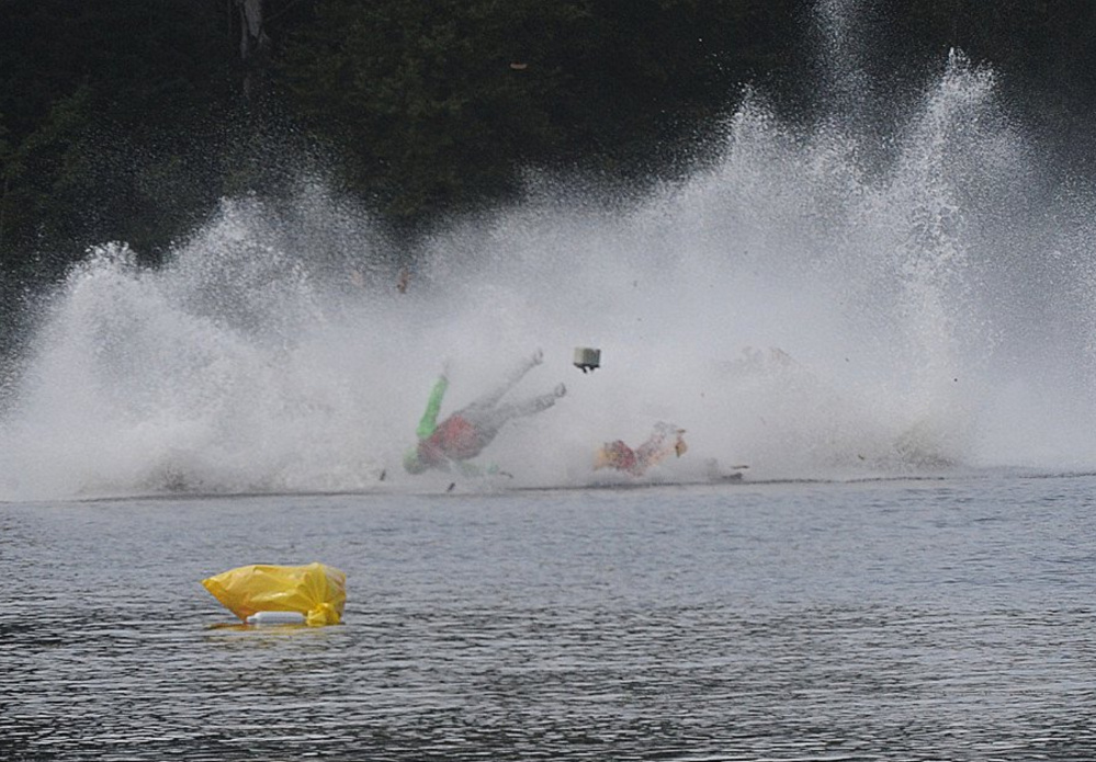 A racer goes airborne during a fatal crash Saturday during a regatta in Taunton, Mass., on Saturday.
