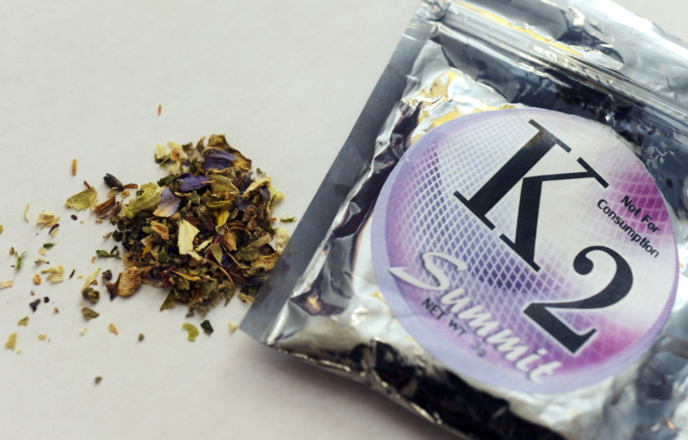 A package holds K2, or spice, which is made by spraying psychoactive chemicals onto plant matter. Enforcing bans on the drug is difficult because its composition keeps changing.