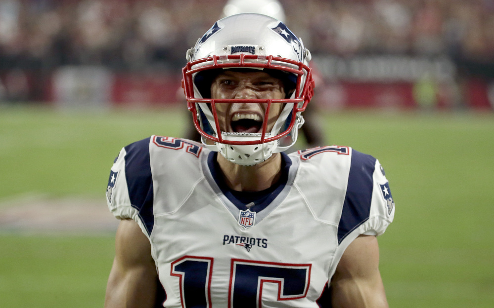 Newcomer Chris Hogan made an immediate impact for the Patriots, catching a touchdown pass in the first quarter, and helped short-handed New England earn a surprising win.