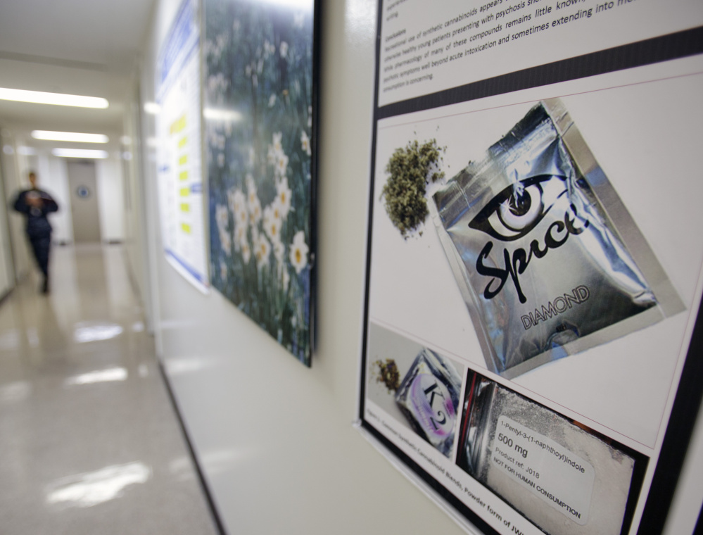A poster at the Naval Hospital in San Diego warns of the dangers of synthetic drugs like spice, which can escape legal scrutiny if their chemical formulas are tweaked slightly.