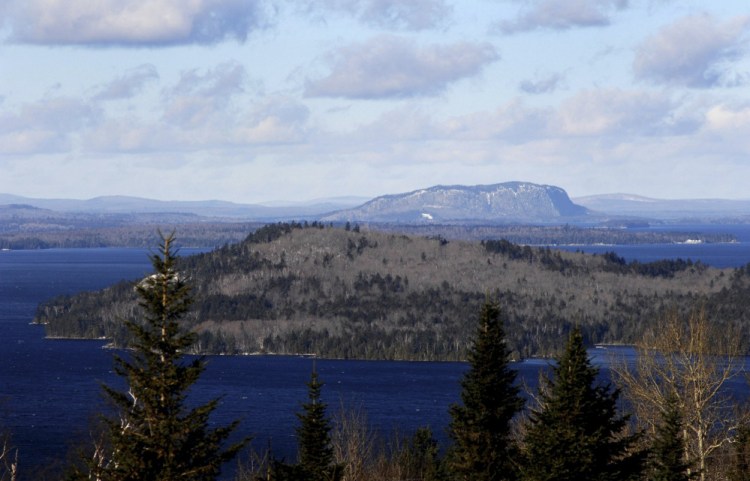 The iconic Mt. Kineo rises above Moosehead Lake in central Maine. Opponents say a wind turbine farm in the area would spoil views and discourage tourism in an area that's trying to become a world-class recreation destination.