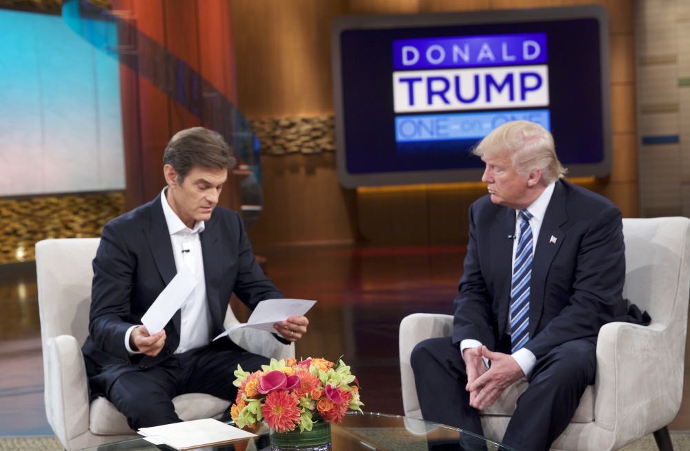 Dr. Mehmet Oz and Republican presidential nominee Donald Trump tape "The Dr. Oz Show," which airs Thursday. "I have it right here. Should I do it? I don't care. Should I do it?" Trump asked before handing Oz the results of his physical exam.