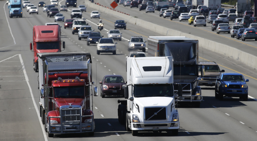 The federal government says that slower tractor-trailers could mean safer highways, and proposes electronic speed limiters on trucks and buses weighing over 26,000 pounds.