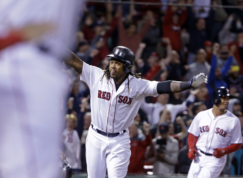 Hanley Ramirez celebrates his three-run walk-off home run in Thursday night's game at Fenway Park. The Red Sox rallied to beat the Yankees, 7-5.