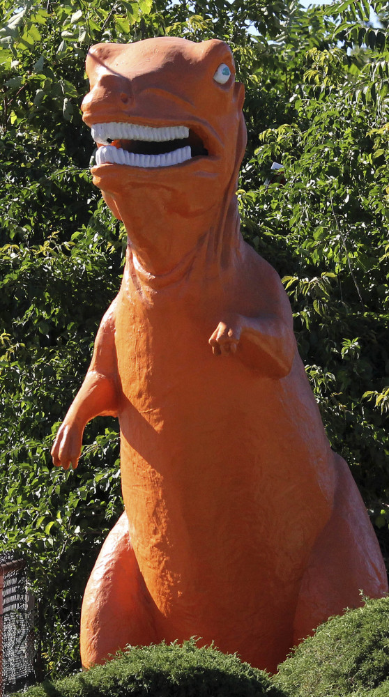 The 20-foot-tall dinosaur in Saugus, Mass., will be installed at a new hotel at the site.