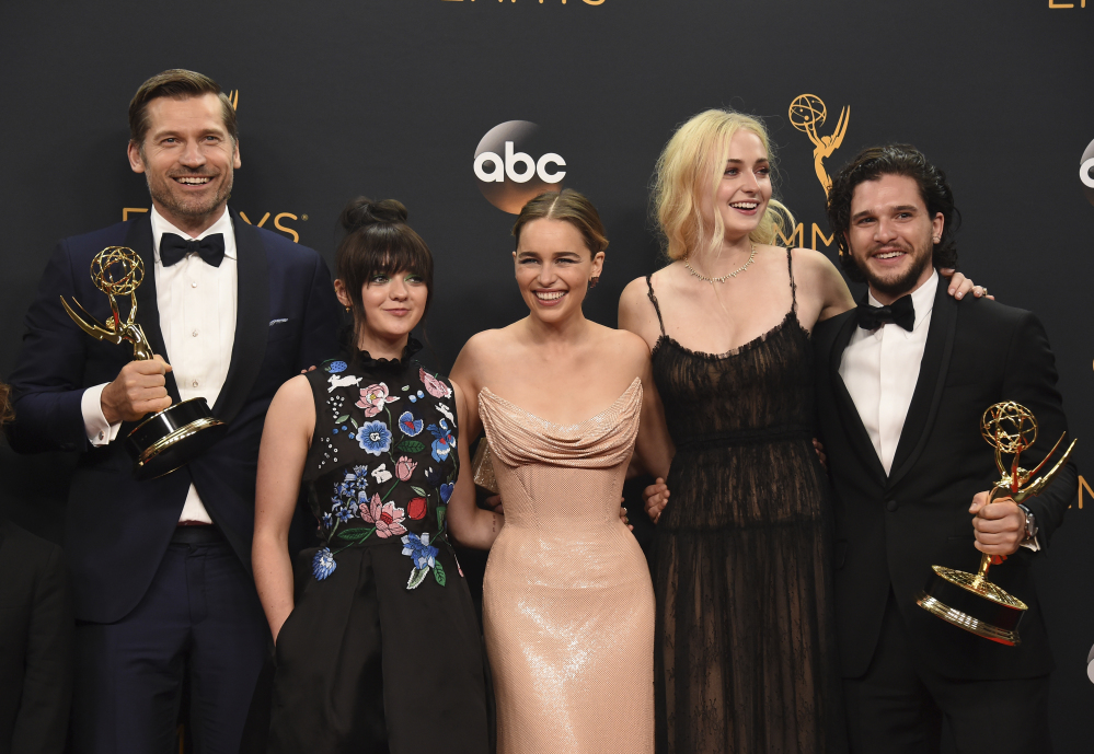 Nikolaj Coster-Waldau, from left, Maisie Williams, Emilia Clarke, Sophie Turner, and Kit Harington – winners of the award for outstanding drama series for "Game of Thrones" – pose in the press room at the 68th Primetime Emmy Awards on Sunday at the Microsoft Theater in Los Angeles.