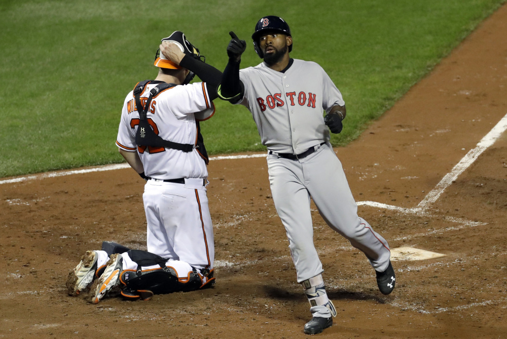 Jackie Bradley Jr. points into the stands after crossing home plate on his solo home run in the fourth inning.