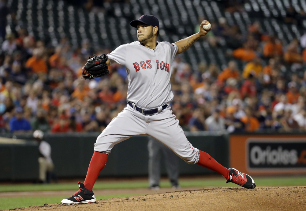 Red Sox starting pitcher Eduardo Rodriguez throws in the first inning Tuesday night in Baltimore. He pitched into the seventh inning and picked up the win.