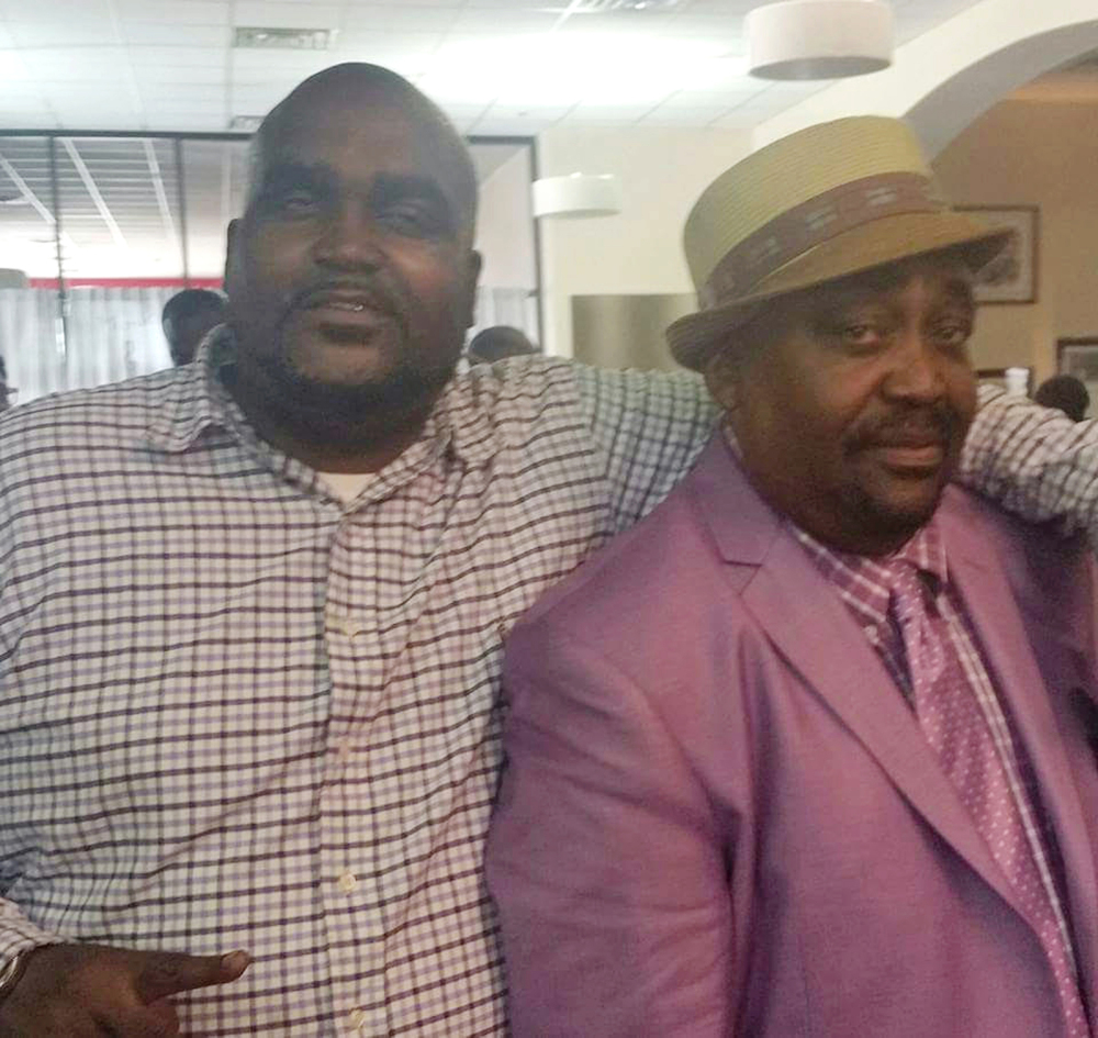 Terence Crutcher, left, shown with his father, Joey Crutcher, was killed by an Oklahoma police officer Friday after Crutcher's vehicle stalled. He was unarmed.