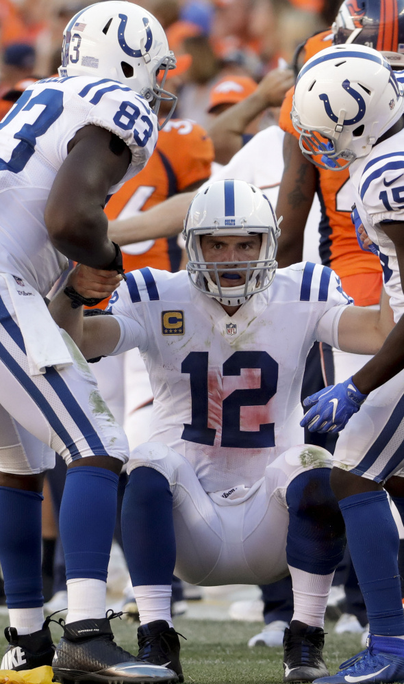 Indianapolis Colts quarterback Andrew Luck, who was knocked down 16 times Sunday in a loss to Denver, missed practice Wednesday but plans to play this weekend against the San Diego Chargers.