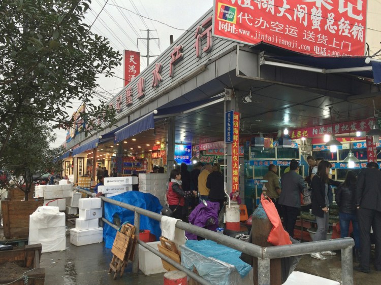 Boxed Maine lobsters sit outside a business in Shanghai in 2015. Officials from Maine companies such as Ready Seafood Co. and Maine Coast Co. have made numerous trips to Asia over the years, visiting clients and attending seafood trade shows to build their export business.