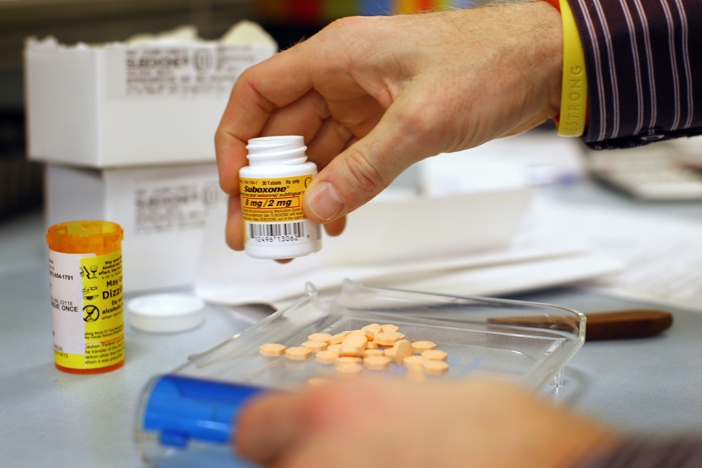 Pharmacist Jim Pearce fills a Suboxone prescription at Boston Healthcare for the Homeless Program in Boston in 2013. Suboxone is an opiate replacement therapy drug used to help treat opiate cravings and withdrawal.