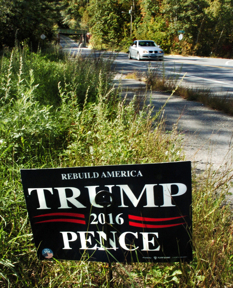 This political sign for Donald Trump and Mike Pence is placed along North Street in Waterville, a short distance from the Colby College campus property on Monday.