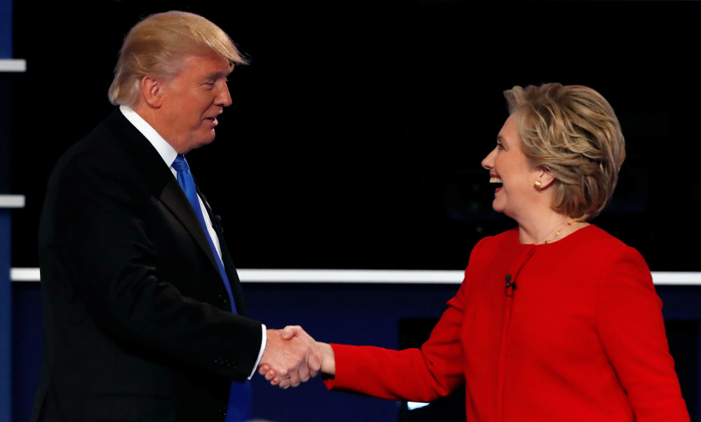 Presidential candidates Republican Donald Trump and Democrat Hillary Clinton shake hands at the end of their first debate at Hofstra University in Hempstead, N.Y., on Monday. The debate format was not ideal for Trump.