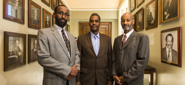 Leaders in the immigrant community gather at Portland City Hall after announcing the formation of the New Mainers Alliance. From left are Mahmoud Hassan, president of the Somali Community Center of Maine, Abdifatah Ahmed, chairman of the New Mainers Alliance, and Elmuatz Abdelrahim, co-founder of the alliance.